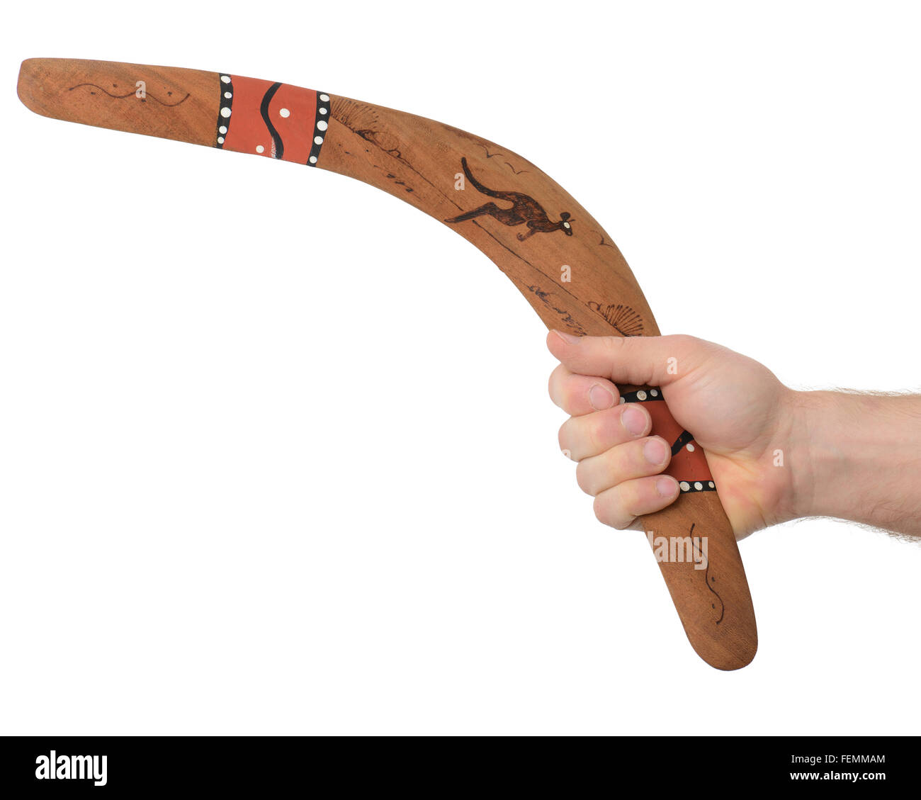 Hand holding a boomerang isolated on a white background Stock Photo