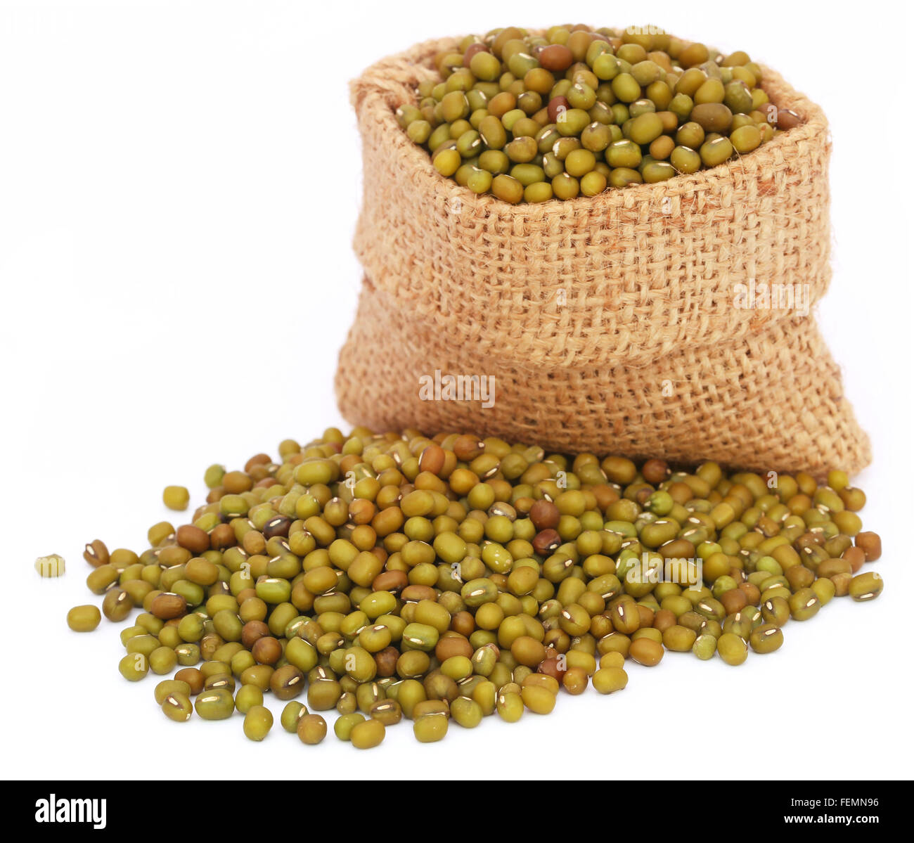 Mung bean in jute bag over white background Stock Photo