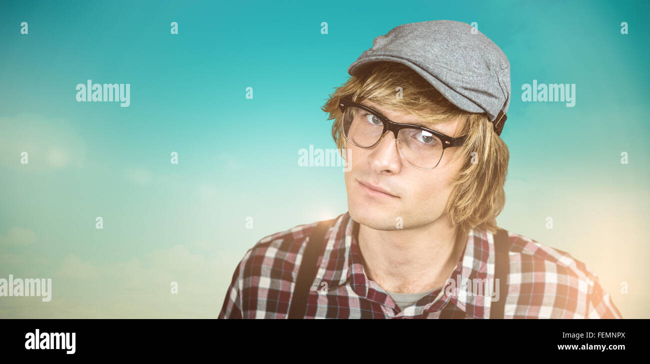 Composite image of serious blond hipster staring Stock Photo