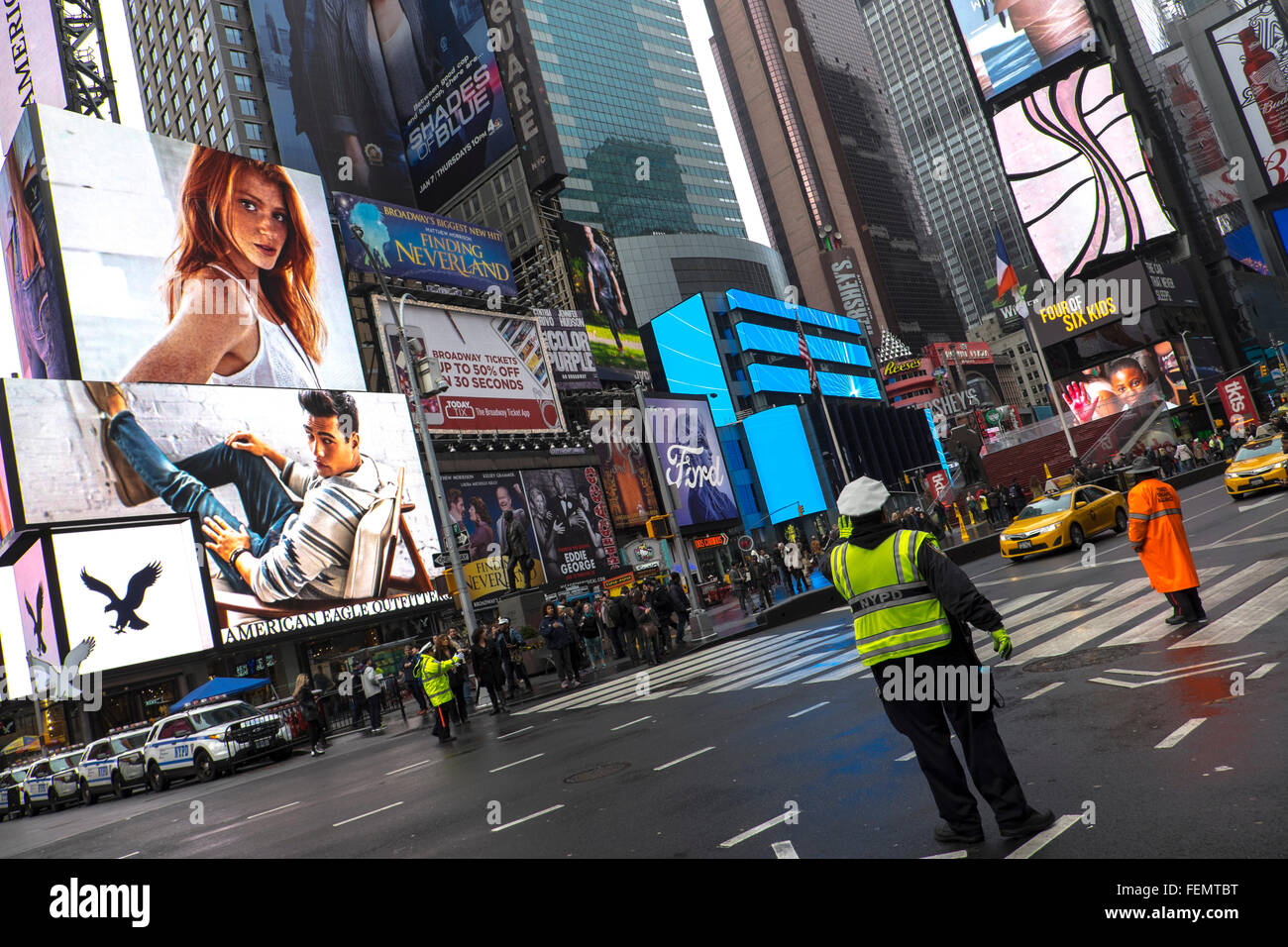 New York Police Department traffic officer, directing traffic in busy Times Square, New York, USA Stock Photo