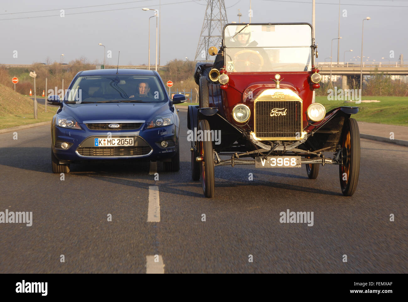 Model T Ford and 2007 Ford Focus, original and current cars from Frod Stock Photo