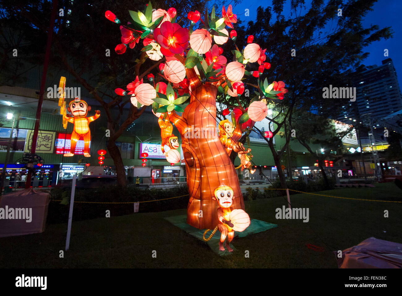 Singapore. 8th February 2016. Chinatown is decorated with a lantern with monkeys climbing and swinging from a tree  as the Chinese community in Singapore celebrates the first year of the Lunar year Credit:  amer ghazzal/Alamy Live News Stock Photo