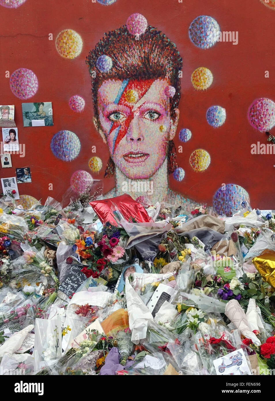 David Bowie graffito in Brixton, London has become a shrine since his death Stock Photo