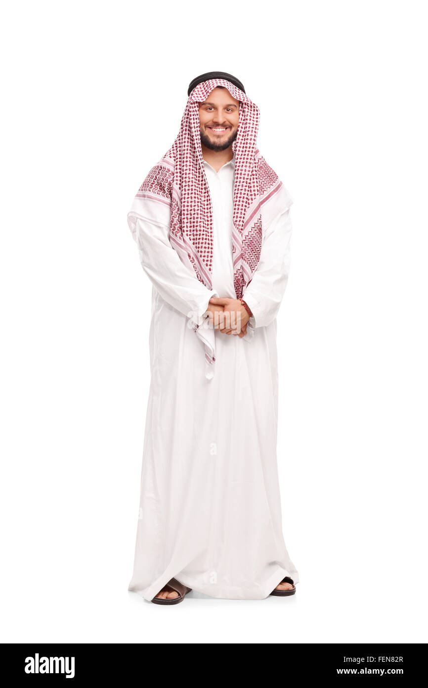 Full length portrait of a young Arab in a white robe and a red veil isolated on white background Stock Photo