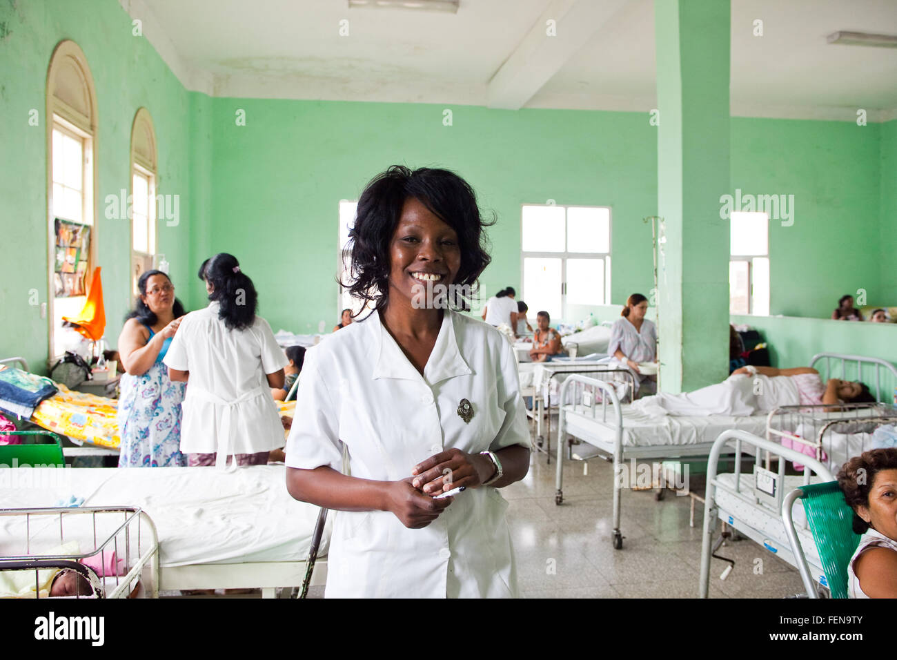 A nurse on the ward in central Havana's maternity hospital, Cuba (permission to photograph was given by mothers) Stock Photo