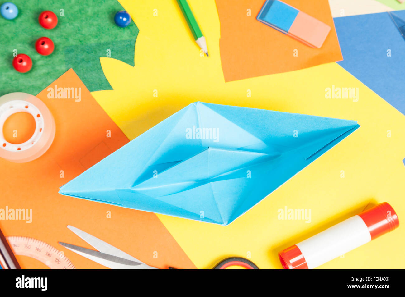 Tinker a paper boat Stock Photo