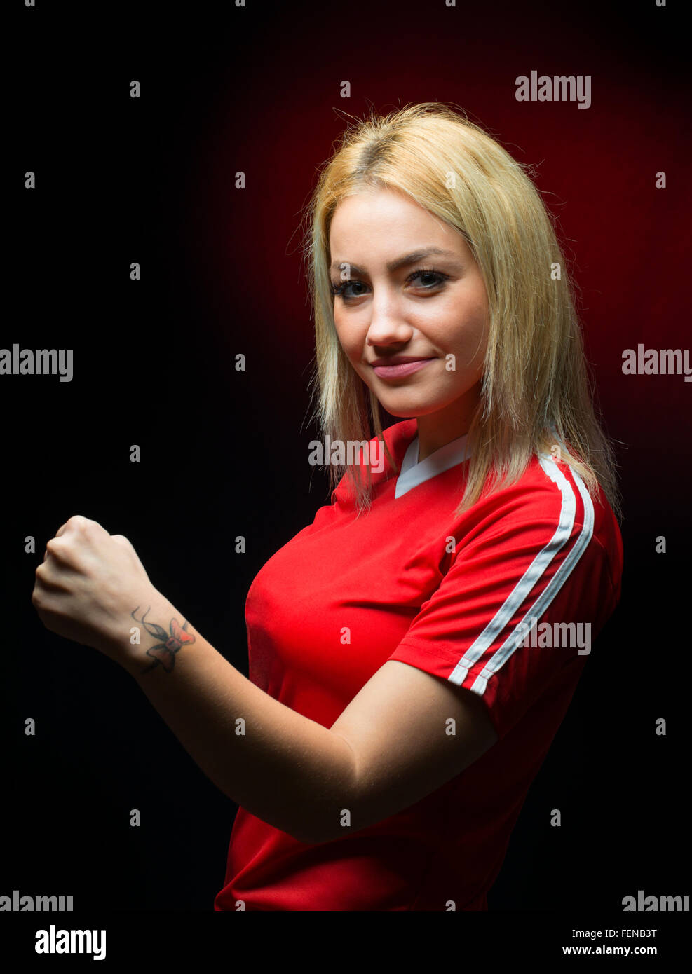 Happy woman soccer fan by scoring a goal Stock Photo Alamy
