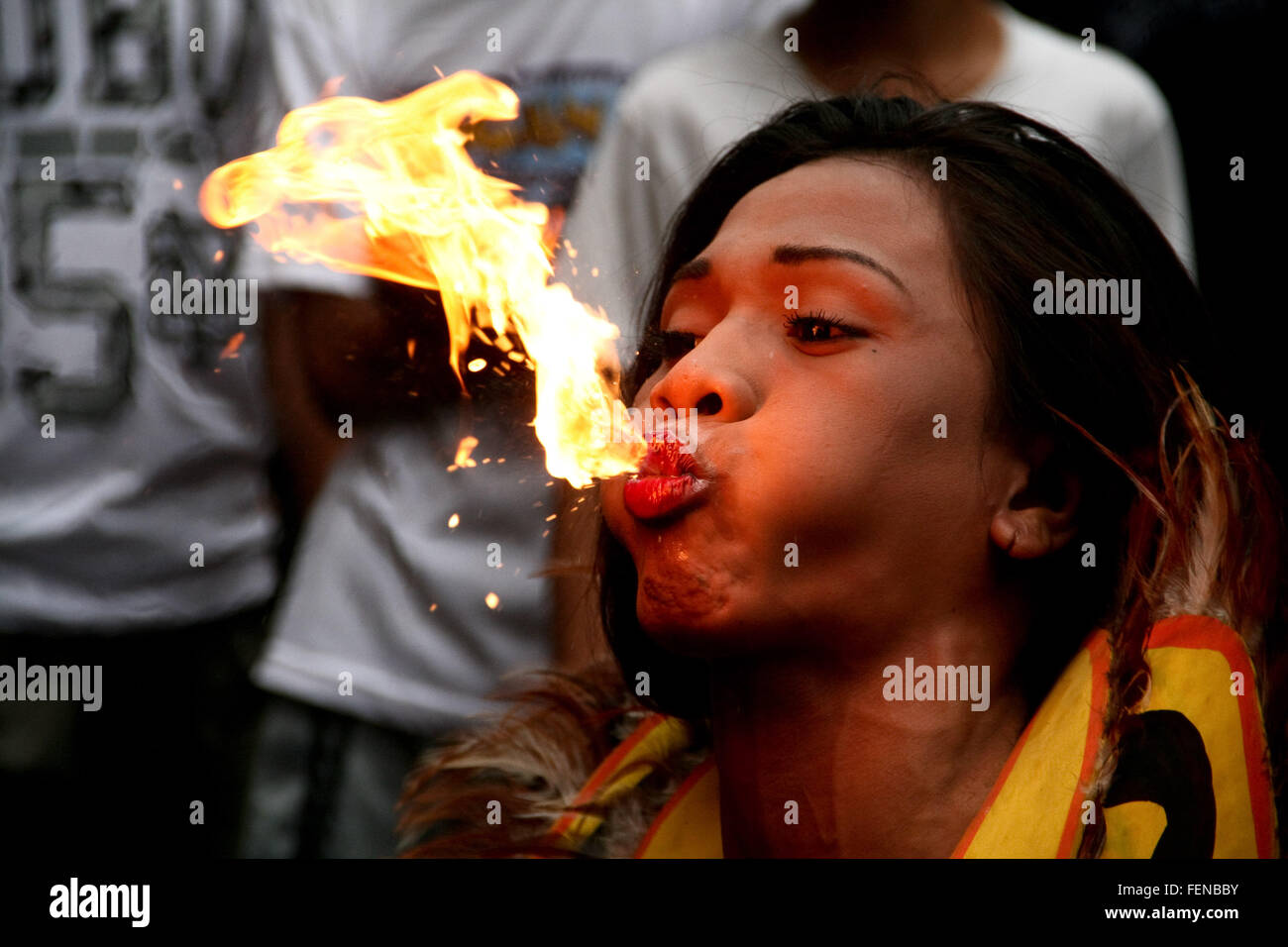 Philippines. 8th Feb, 2016. A fire eater blows fire in Ongpin, Binondo. Thousands joined the Chinese New Year festivities in Binondo, Manila. Binondo is considered to be the oldest Chinatown in the world. © J Gerard Seguia/ZUMA Wire/Alamy Live News Stock Photo