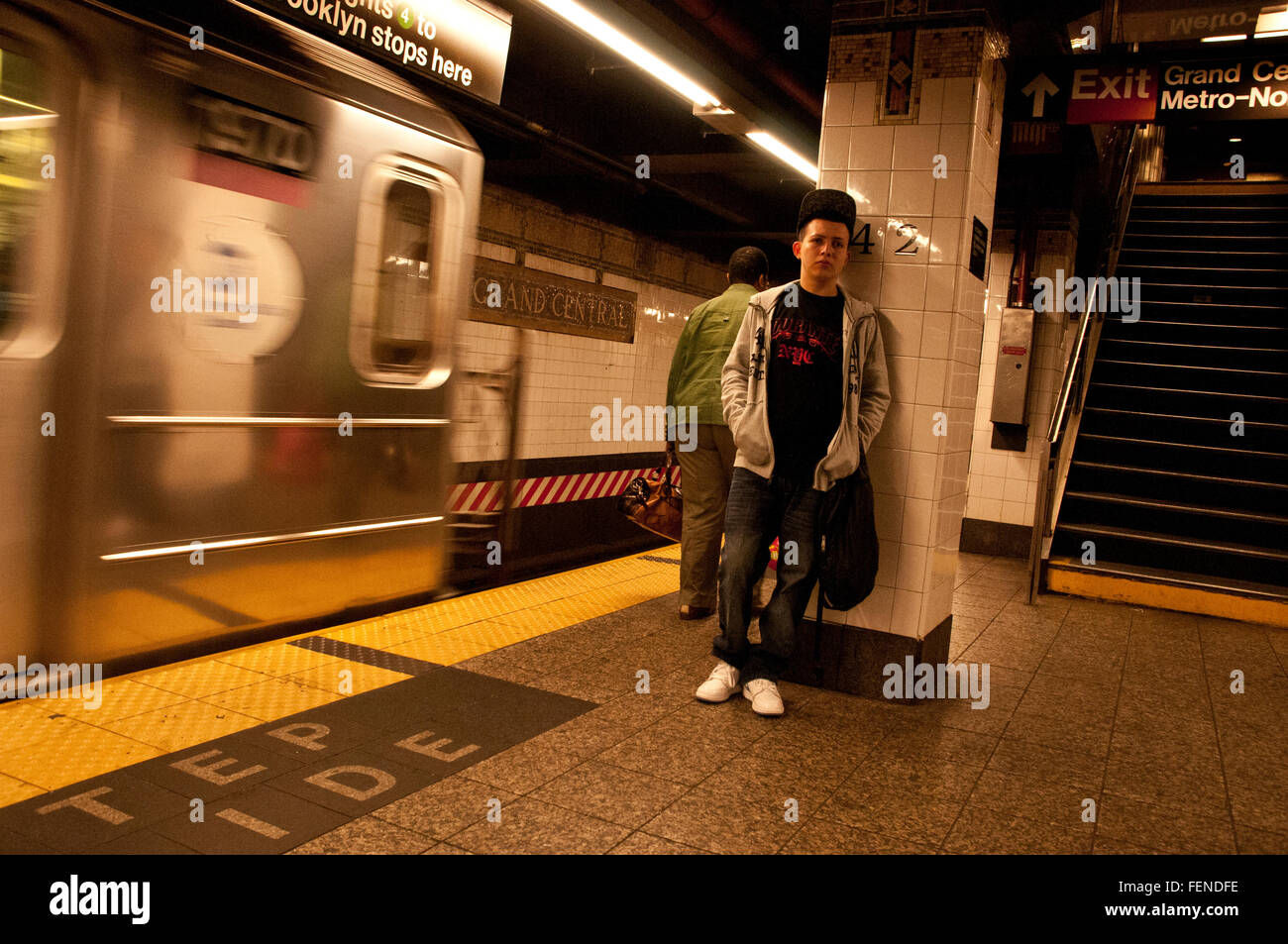 Waiting for a subway train in Grand Central station New York City Stock Photo