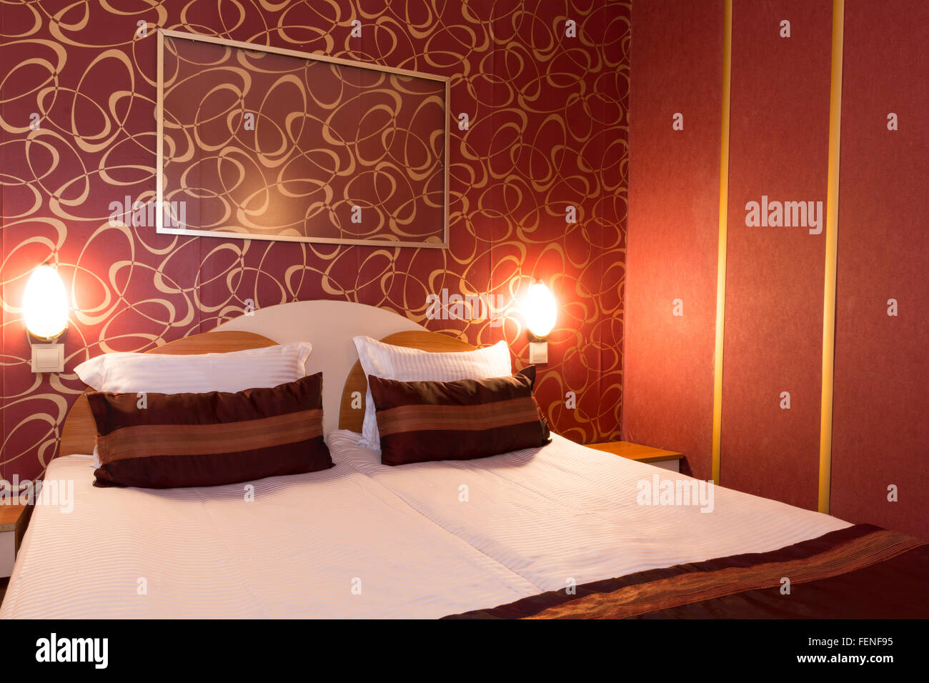 Hotel room at a brothel furnished modern where men hiring prostitutes Stock Photo