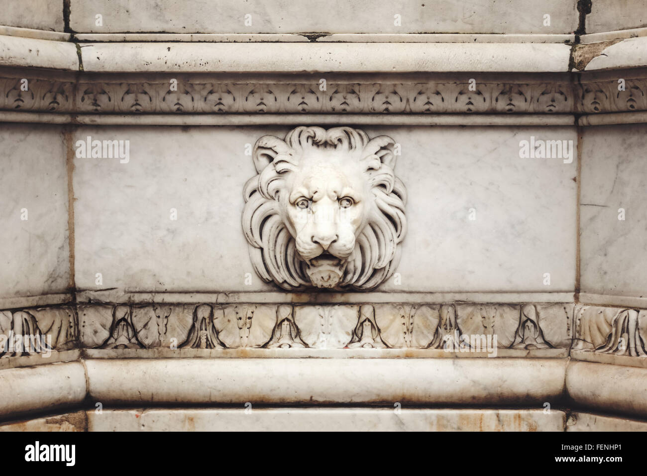 Ancient Marble Lion Head BasRelief on the Wall. Architecture Details