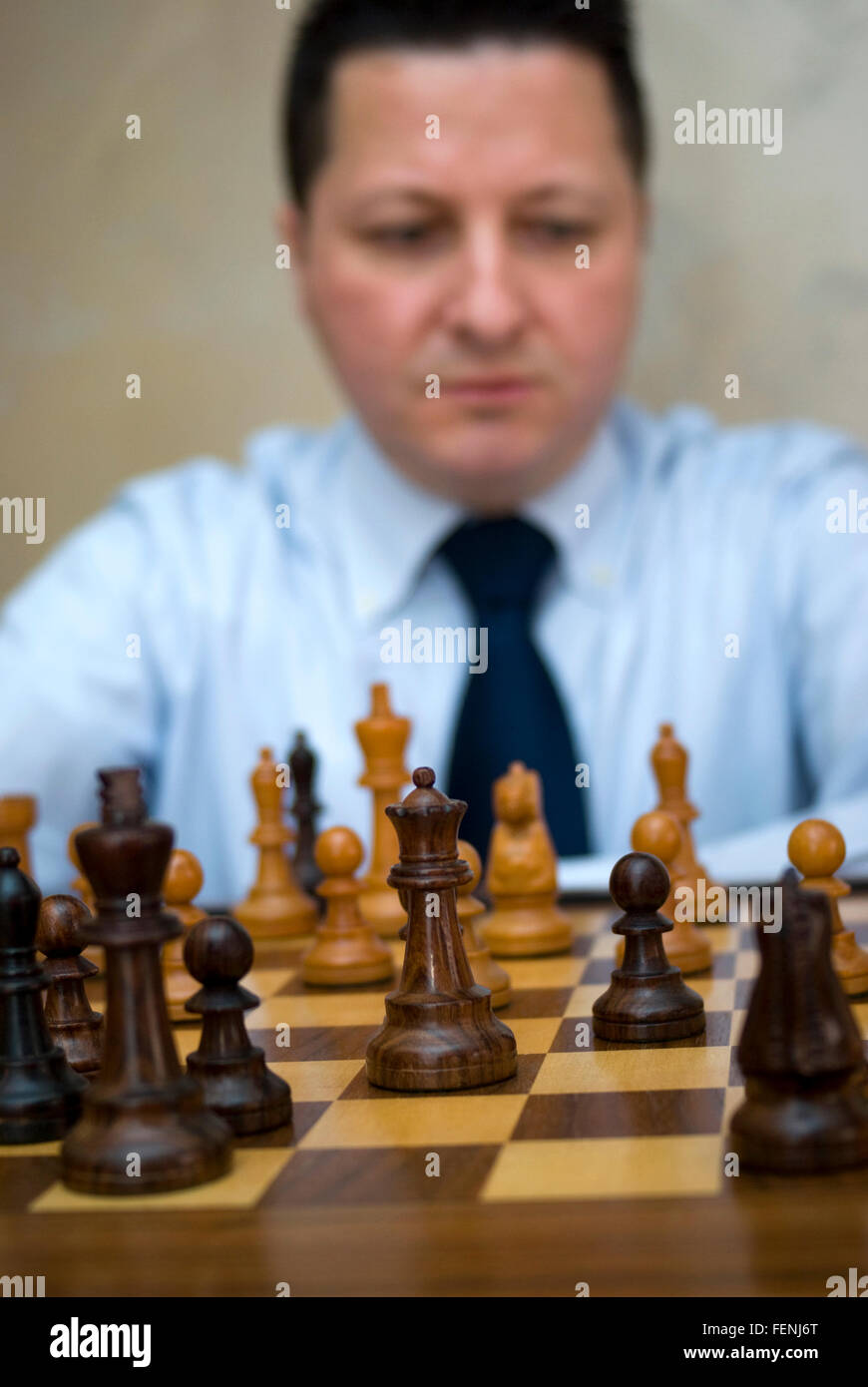 Chess player playing his game Stock Photo Alamy