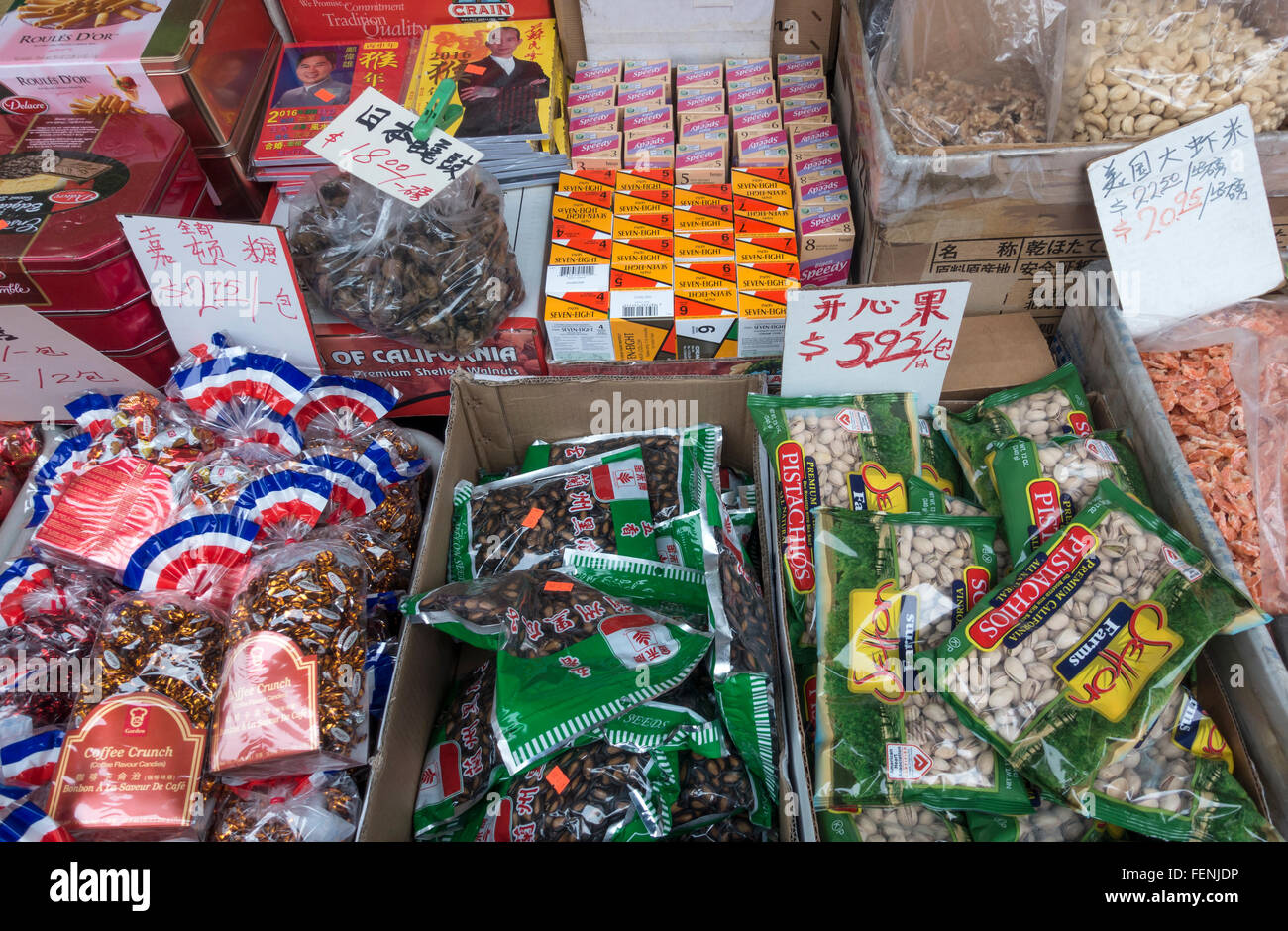 A selection of snacks and other items for sale at a street stall on