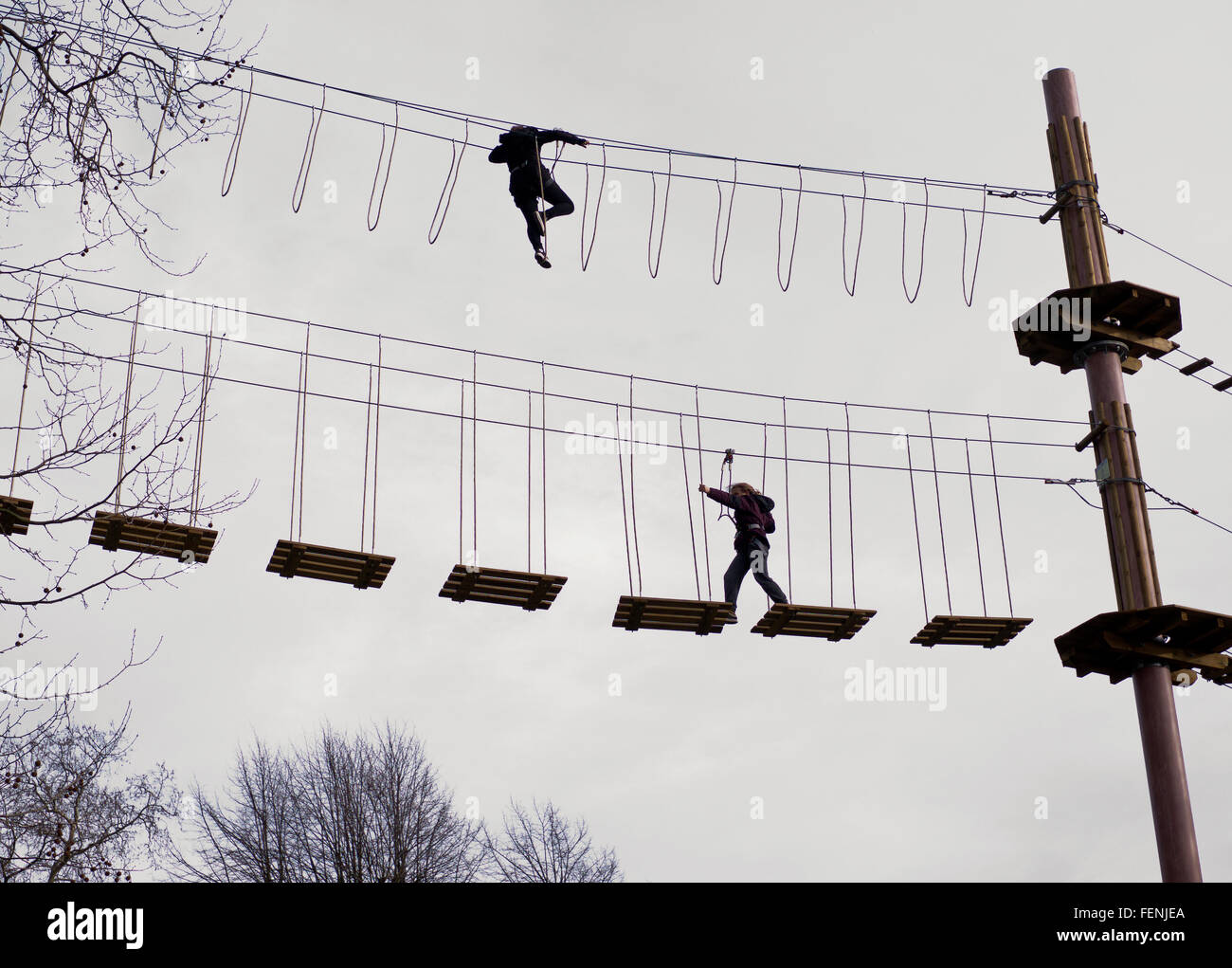 High wire walking in Battersea Park activity centre London Stock Photo