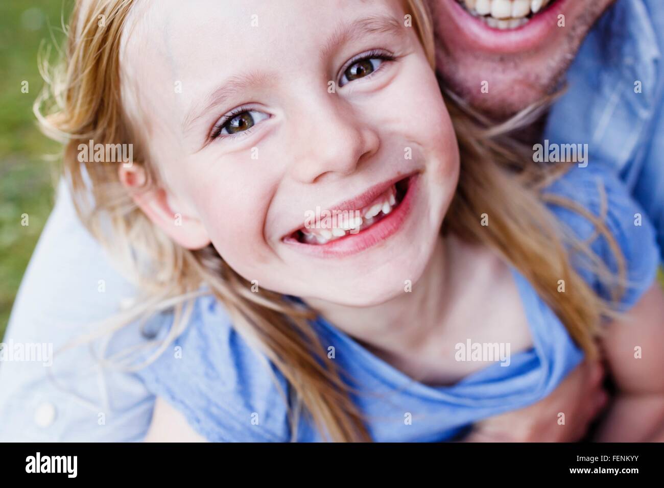 Cropped close up of father and daughter in park Stock Photo