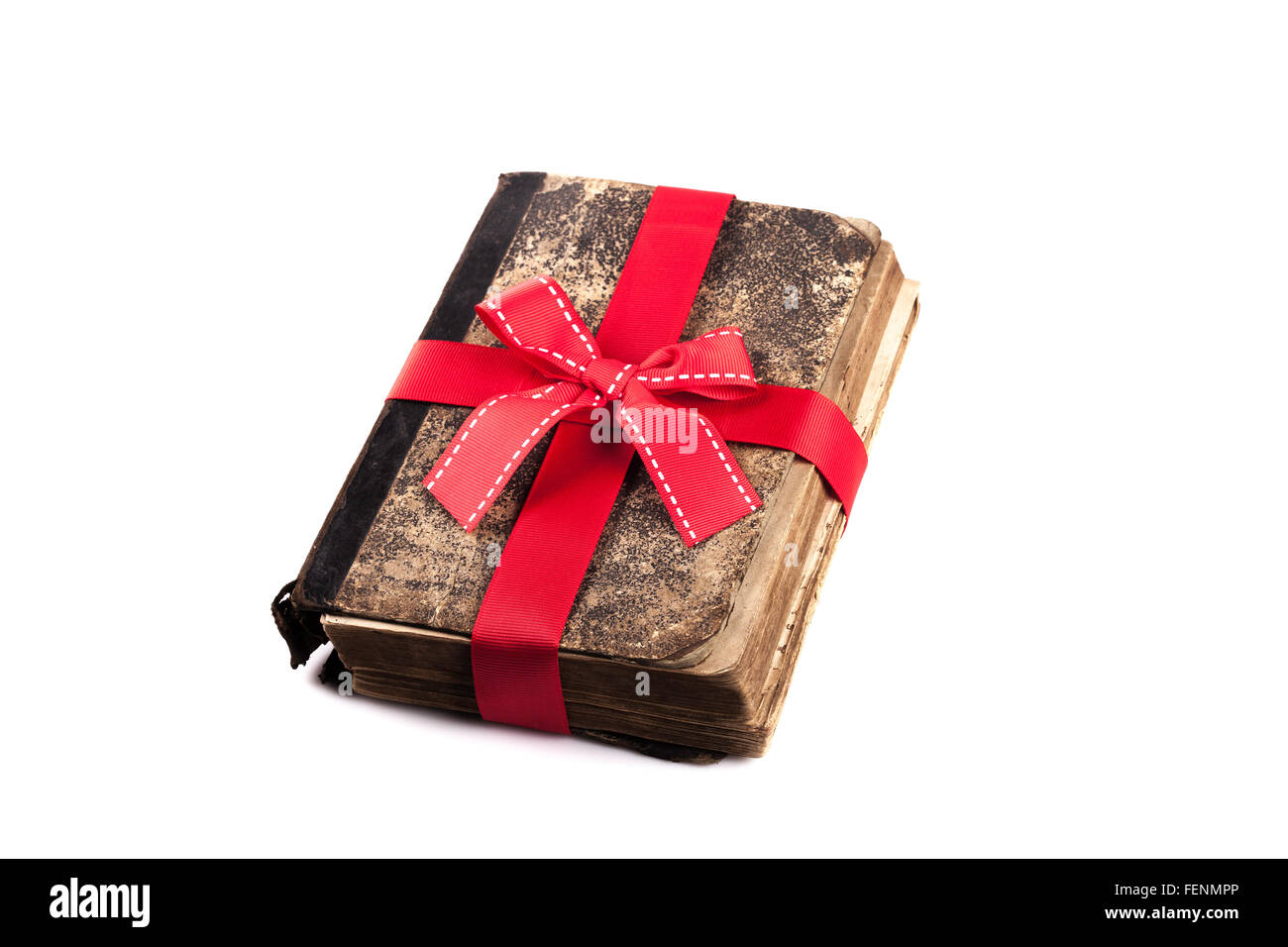 old vintage book in a gift ribbon isolated on white Stock Photo