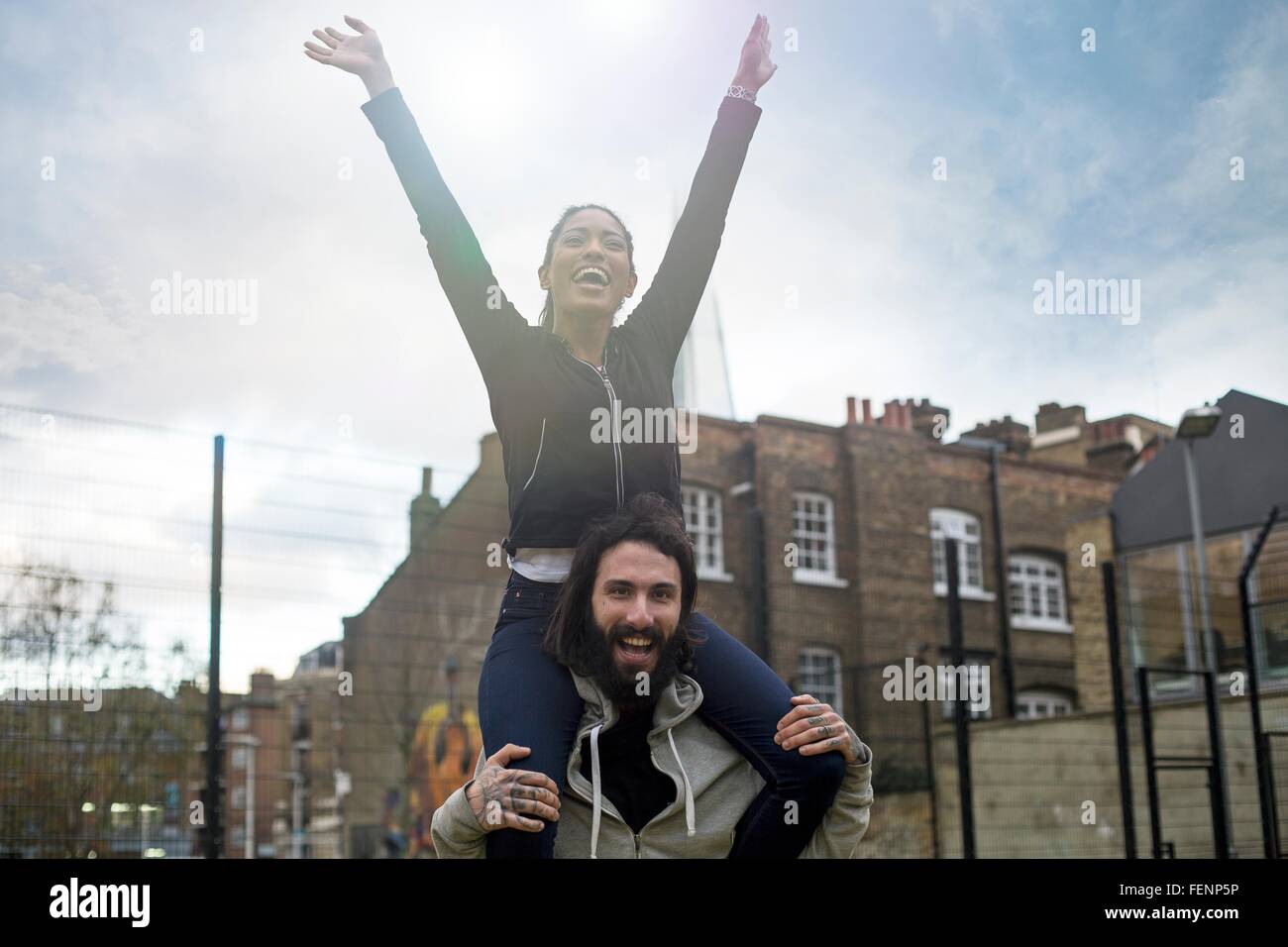 Man shoulder carrying woman hi-res stock photography and images - Alamy