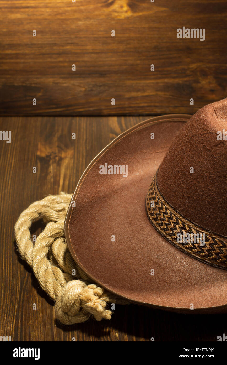 cowboy hat on wooden background Stock Photo - Alamy