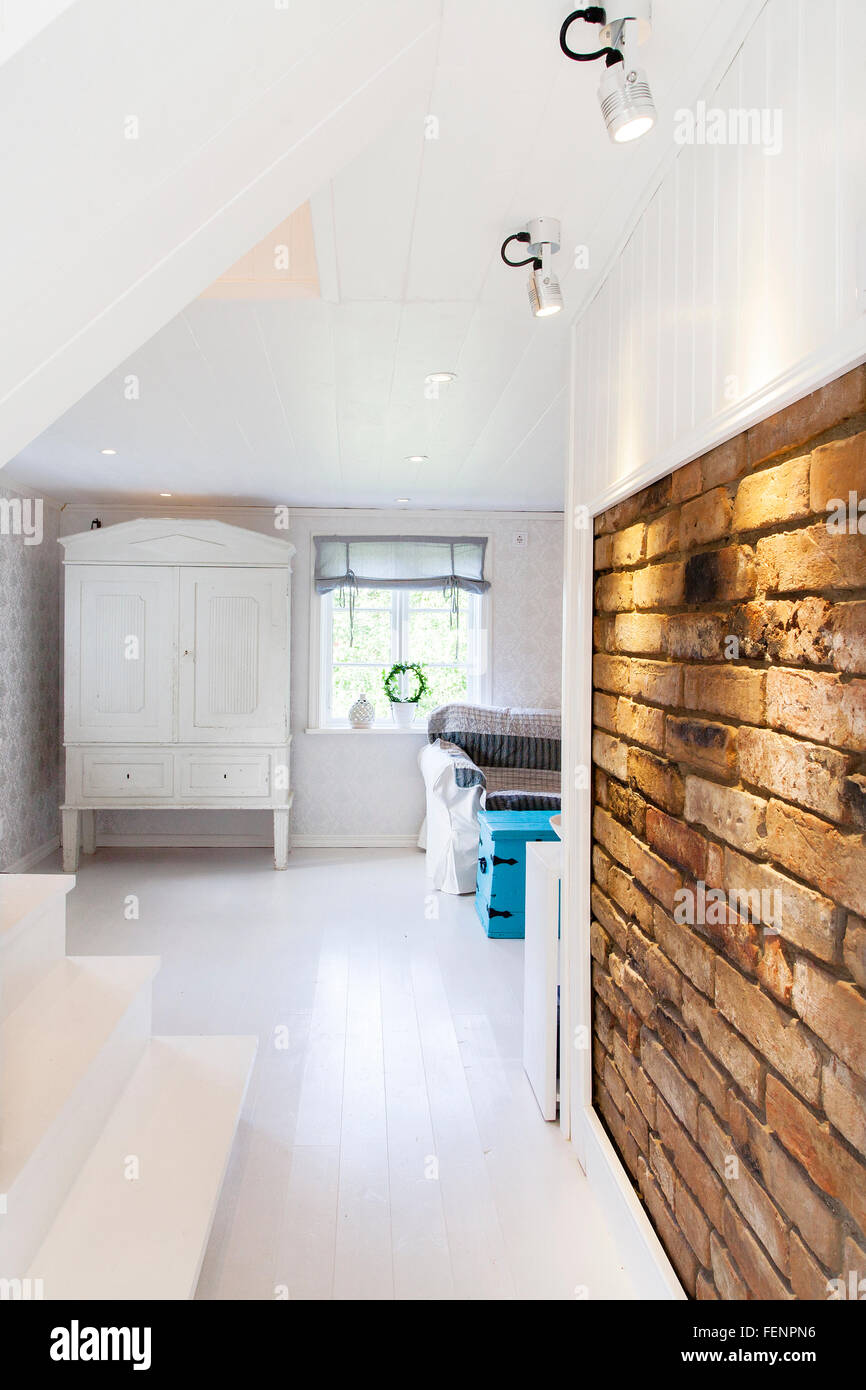 hallway fancy interior in a countryhouse with brickwall Stock Photo