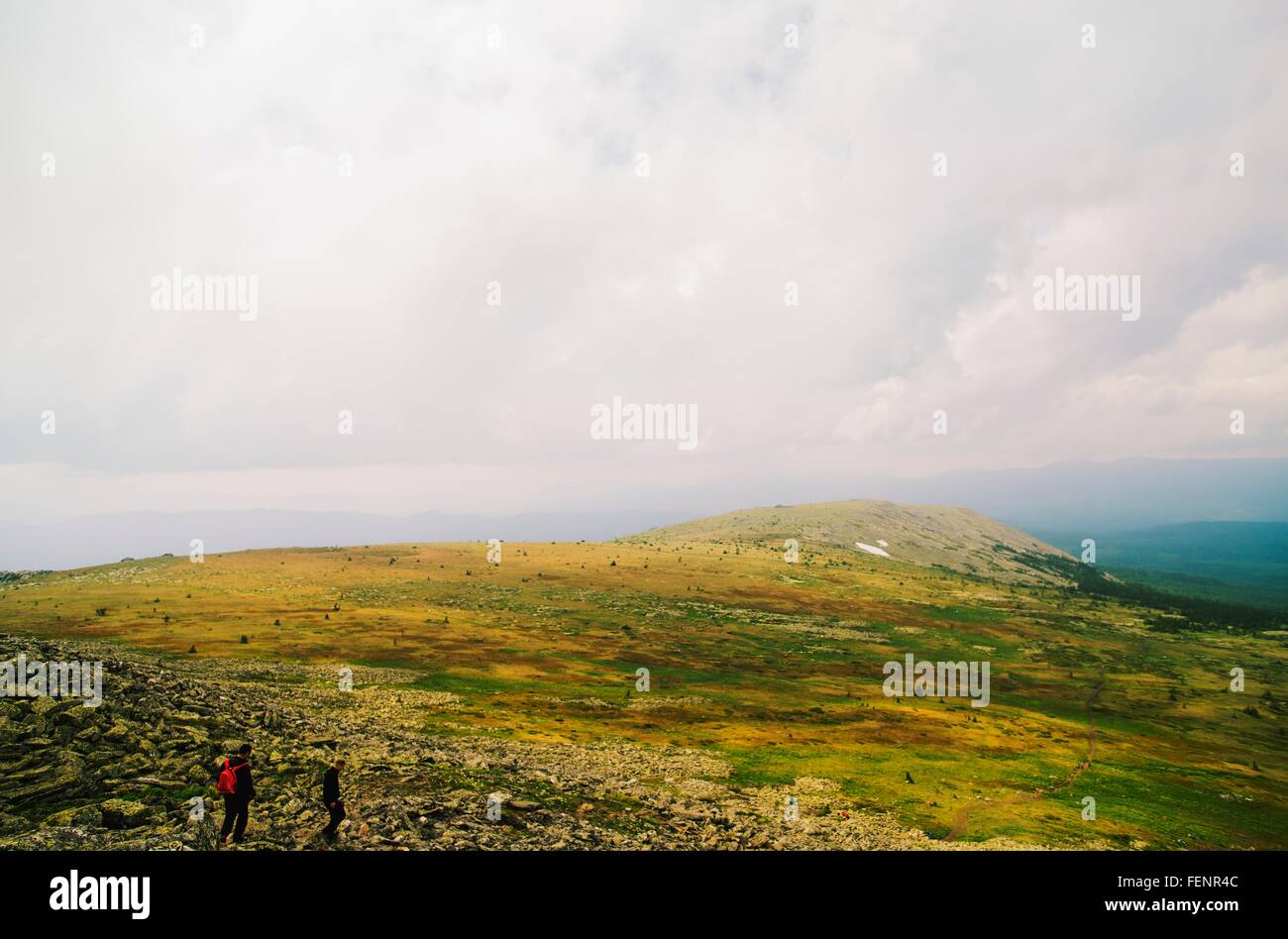Two men hiking in Ural Mountains, Russia Stock Photo