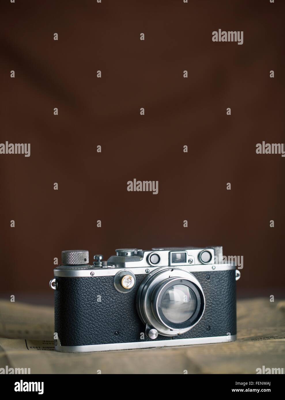 Vintage camera, brown background Stock Photo