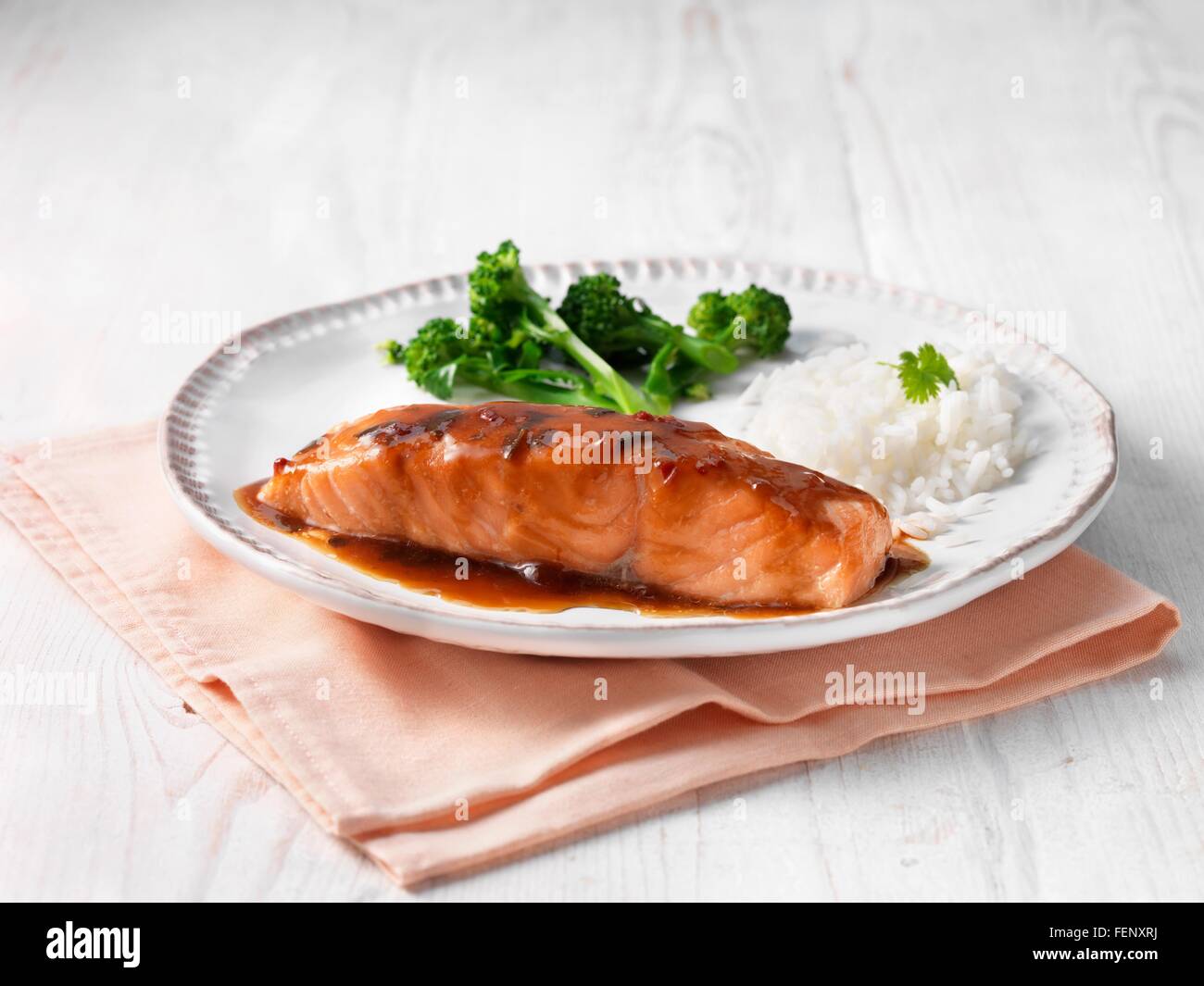 Scottish salmon with teriyaki sauce, broccoli and rice Stock Photo
