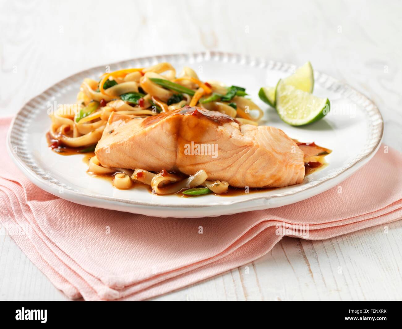 Scottish salmon with teriyaki sauce, noodles and stir fry vegetables Stock Photo