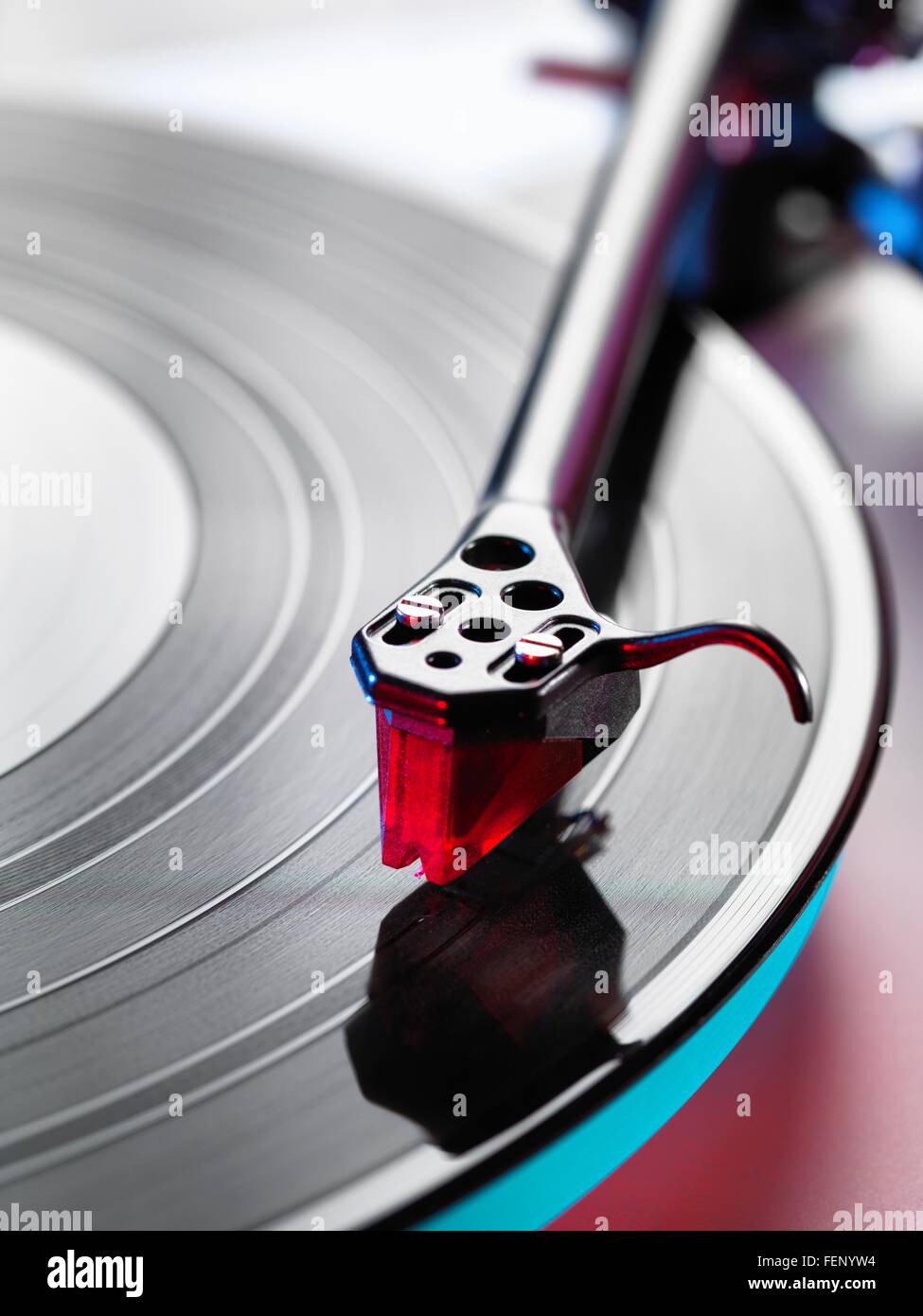 Close up of turntable stylus playing a vinyl record Stock Photo