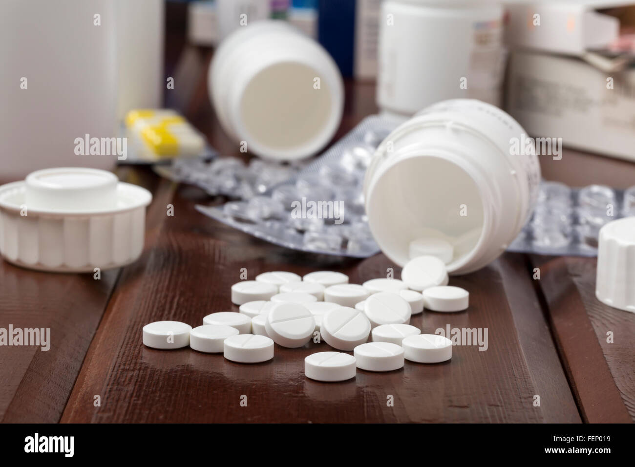 White round pills,empty blister pack and pill bottles Stock Photo