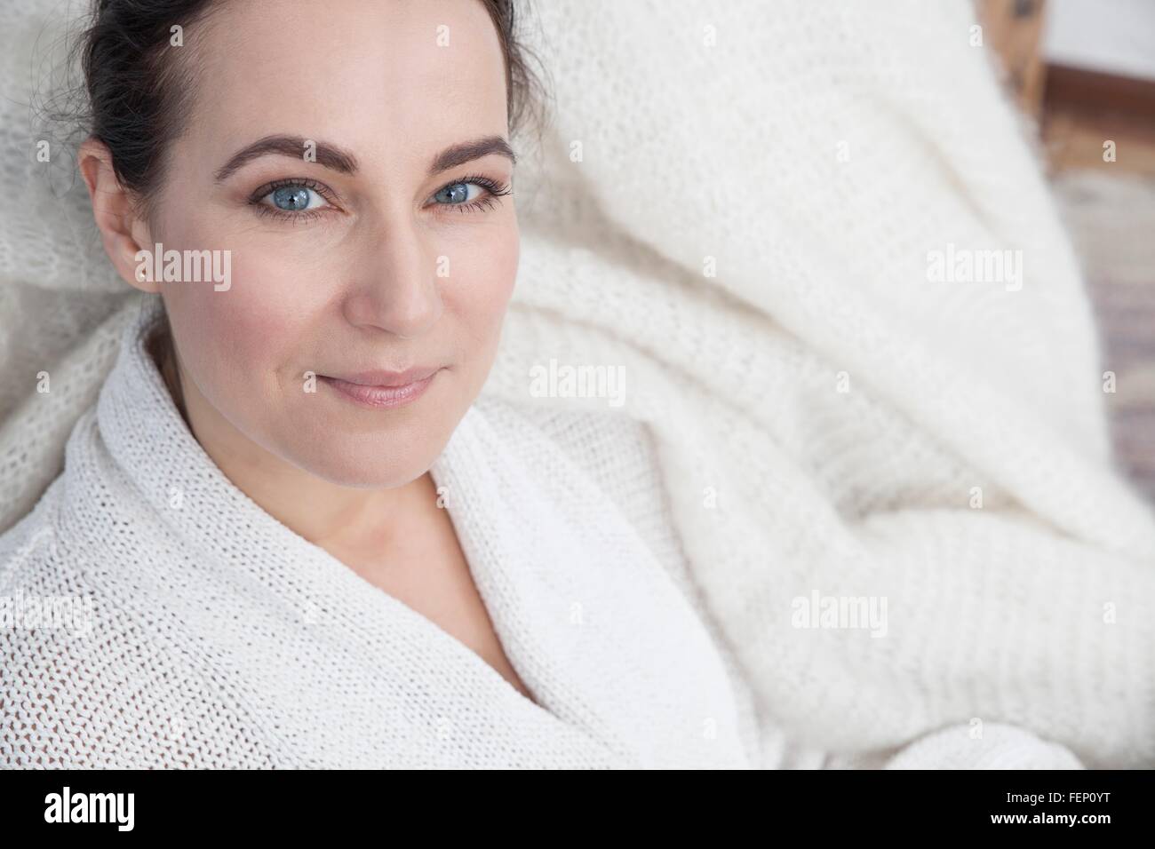 Portrait of a woman relaxing at home Stock Photo