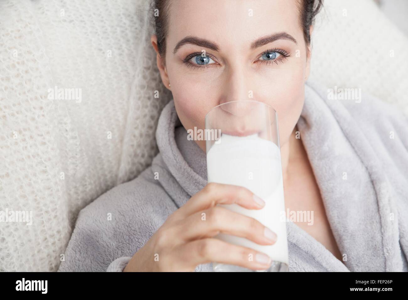 Woman drinking glass milk portrait hires stock photography and images
