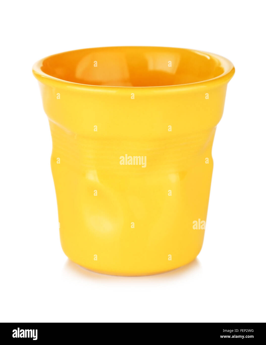 original yellow espresso cup, isolated on white Stock Photo Alamy