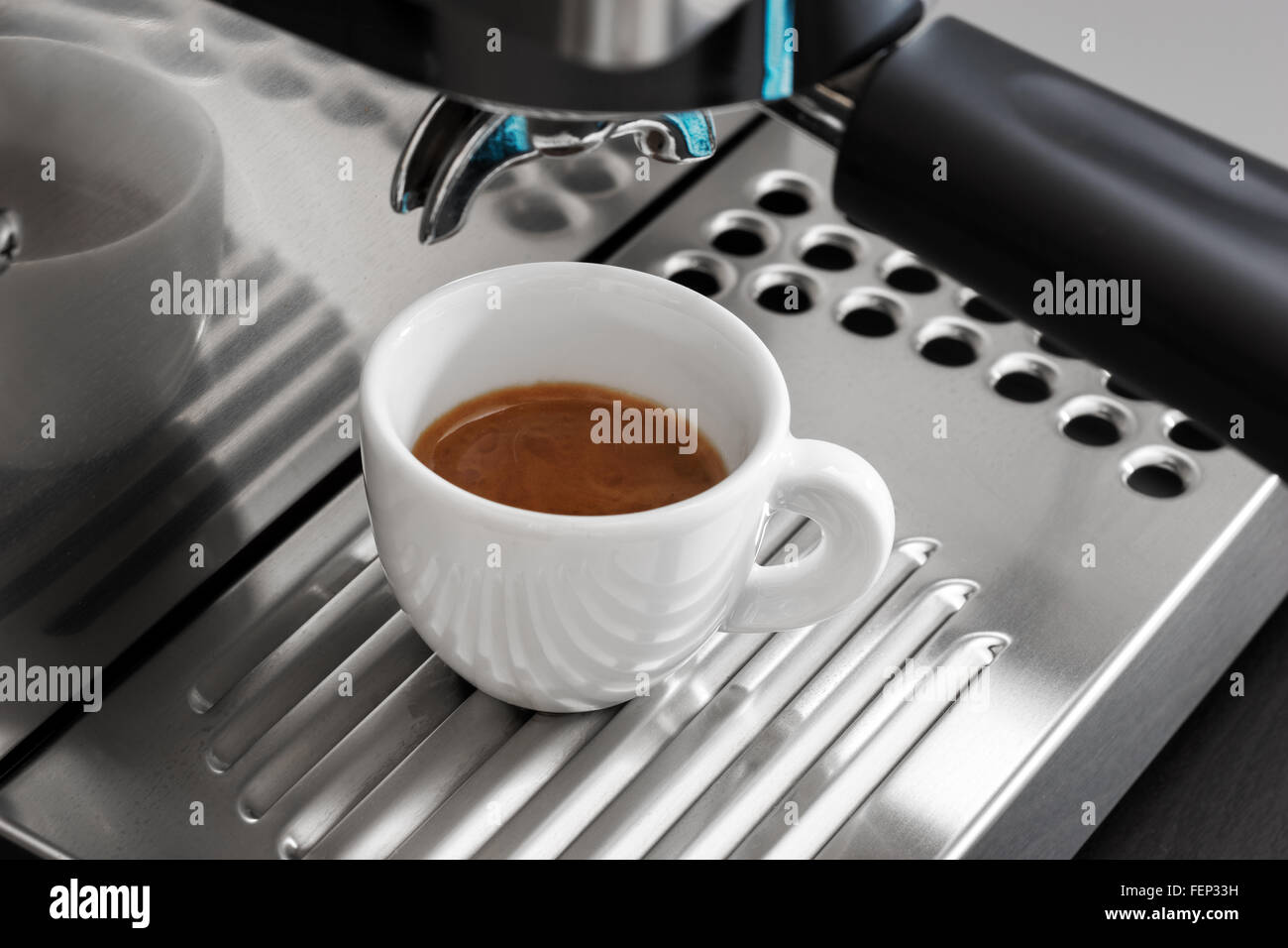 Espresso machine brewing a coffee Stock Photo Alamy