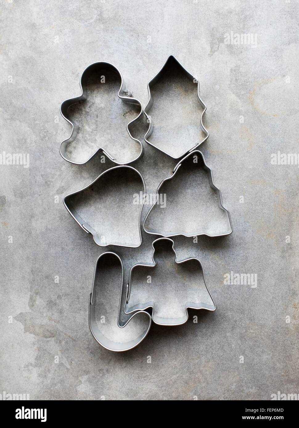 Overhead view of selection of Christmas cookie cutters Stock Photo