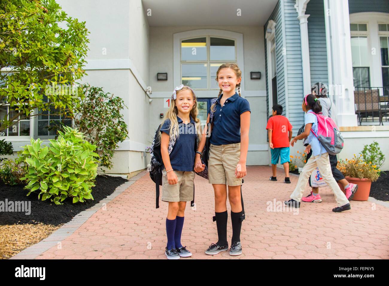 Group girls in school uniform hi-res stock photography and images - Alamy