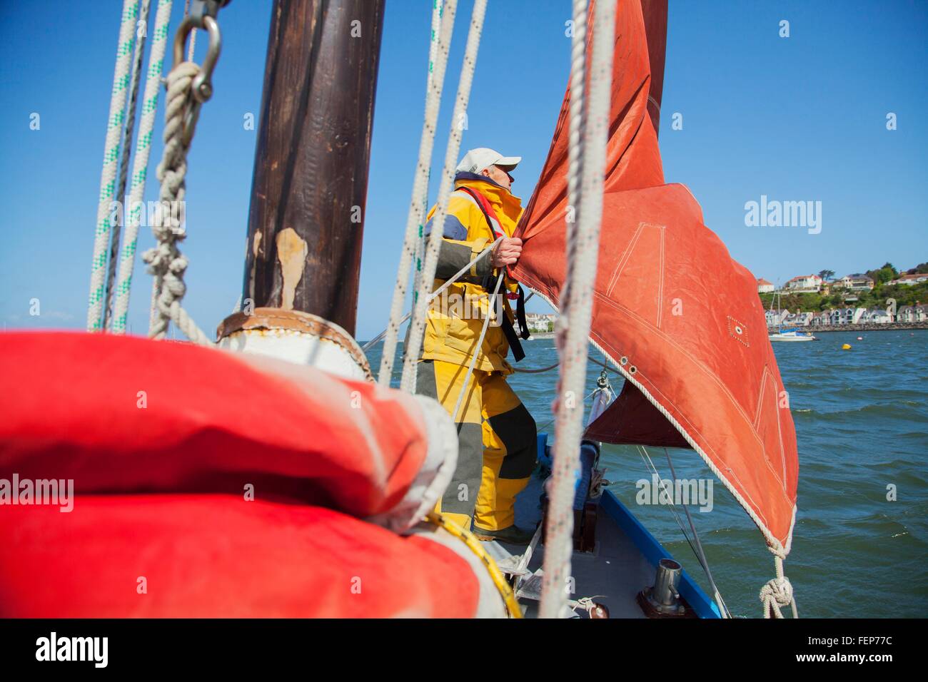 Senior man on sailing boat Stock Photo