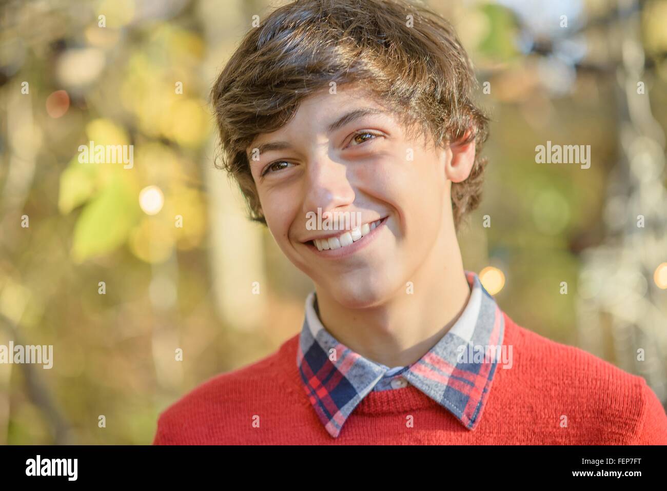Portrait of teenage boy in woods Stock Photo