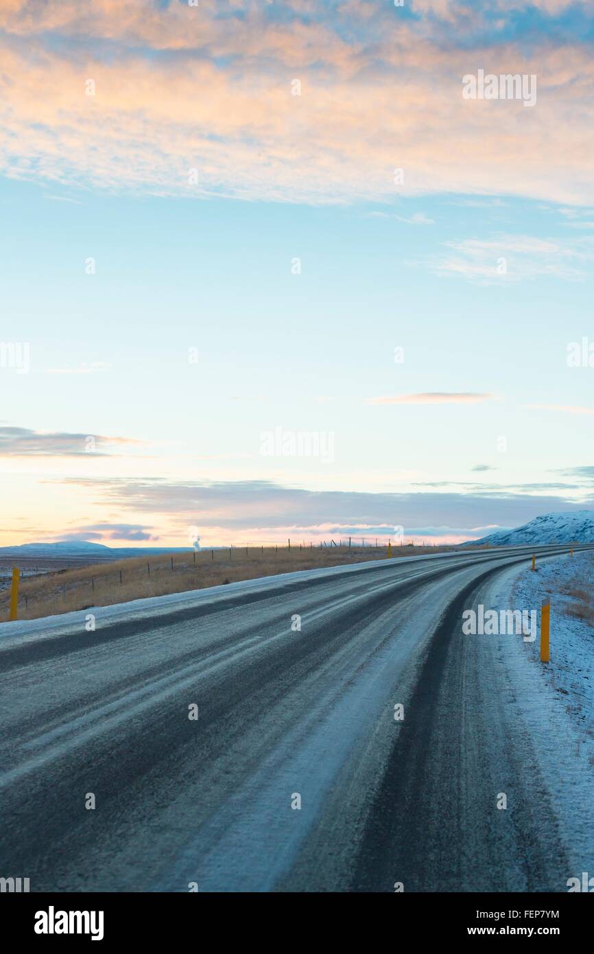 Country road at sunset, Iceland Stock Photo