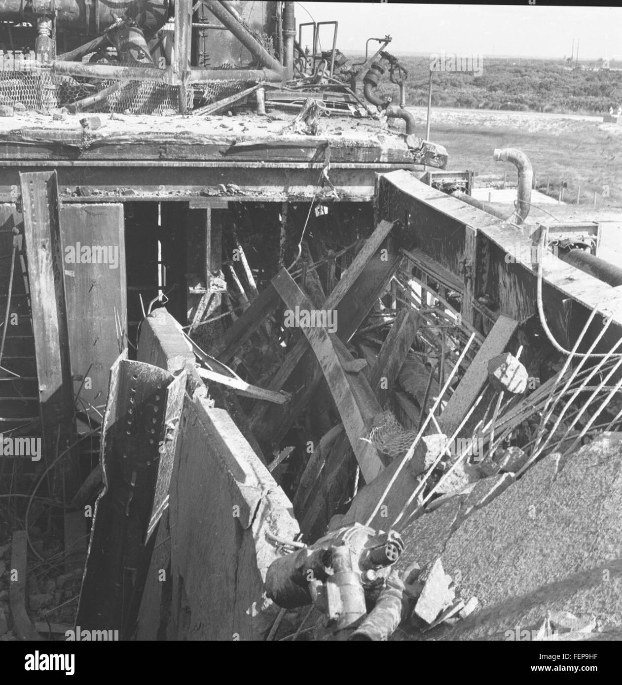 The image details damage to the Atlas ABLE 9C missile at Pad 12, taken on the specified date. It illustrates the challenges faced during missile testing and highlights the technical aspects of the Atlas missile program. Stock Photo