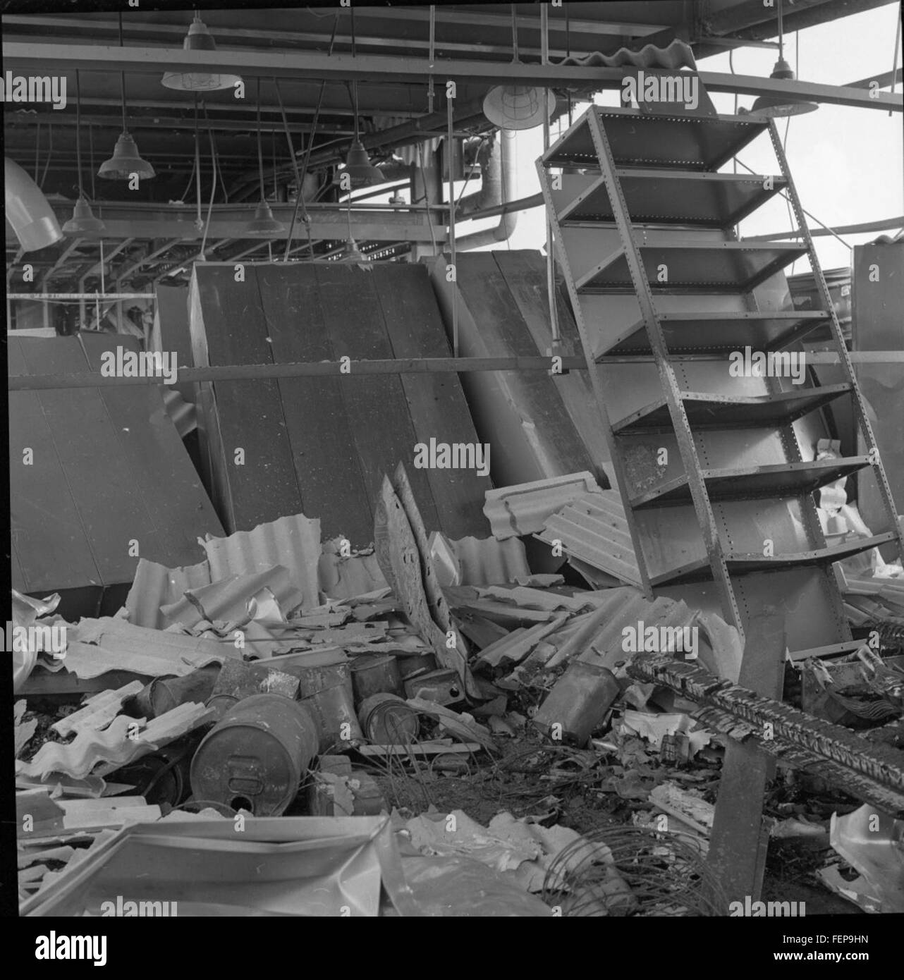 This image shows details of the damage to the Atlas 9C rocket at Pad 12, providing a historical record of the event during its launch preparation phase in the space program. Stock Photo
