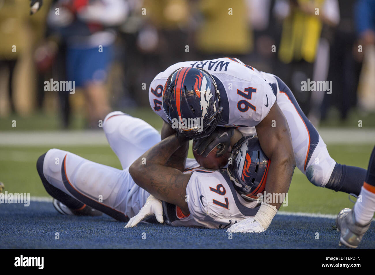 Feb. 7, 2016 - Santa Clara, California, USA - Denver Broncos defensive end Malik Jackson (97) is hugged by teammate Denver Broncos outside linebacker DeMarcus Ware (94) after recovering a Cam Newton fumble in the first quarter in Super Bowl 50 on Sunday, February 7, 2016 at Levi's Stadium in Santa Clara, Calif (Credit Image: © Jose Luis Villegas/Sacramento Bee via ZUMA Wire) Stock Photo