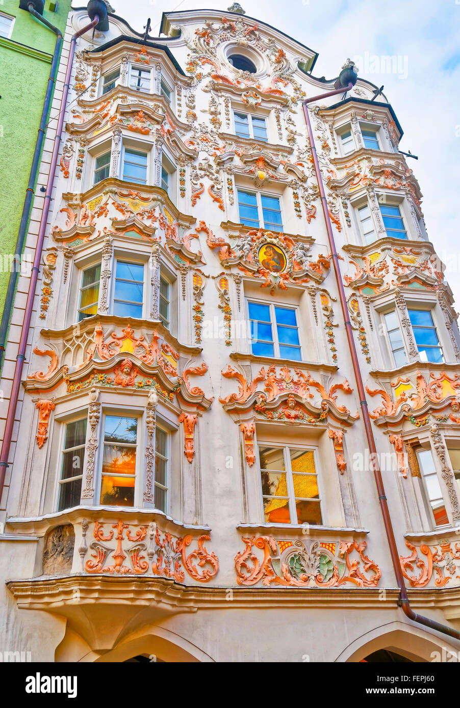INNSBRUCK, AUSTRIA - JANUARY 4, 2010: Helblinghaus called as House of Helbling with Baroque style facade in Innsbruck of Austria. Ornamental facade is decorated with sculpture and decorative elements Stock Photo