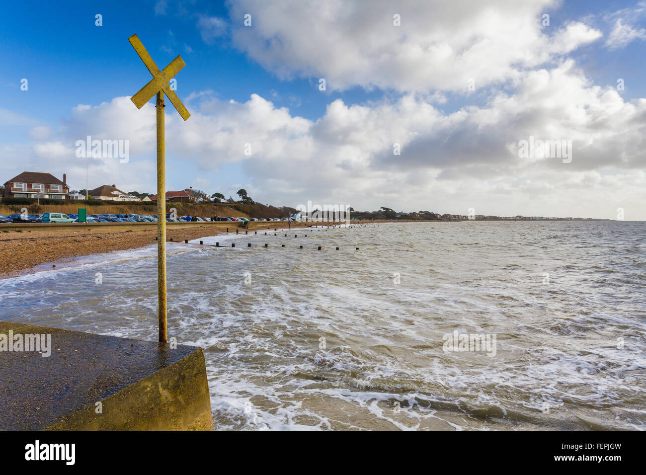 The beach at Hill Head on the coast of the Solent on a bright but
