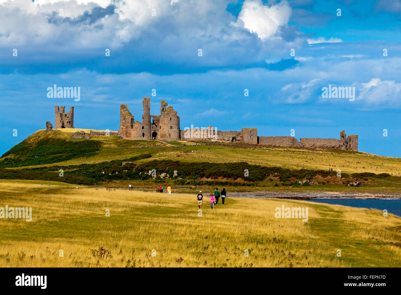 The ruins of Dunstanburgh Castle in Northumberland north east England ...