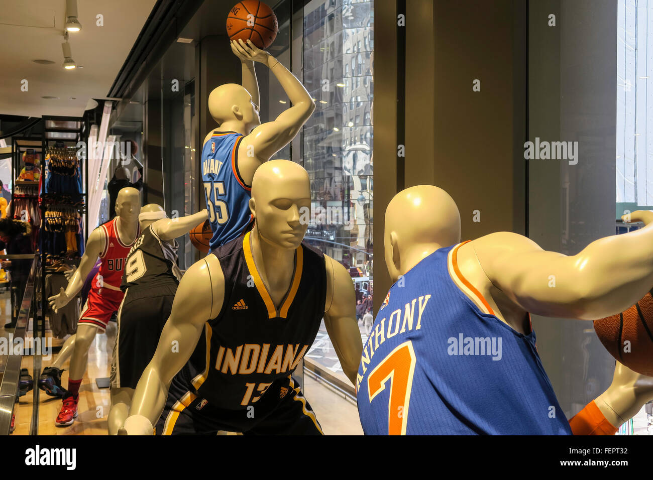 NBA logo and basket with basketball at storefront on 5th avenue in