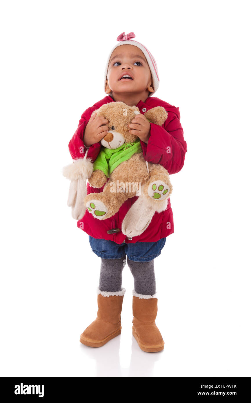 little girl holding a teddy bear