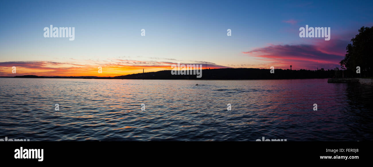 Calm sunset and clouds over lake Stock Photo - Alamy