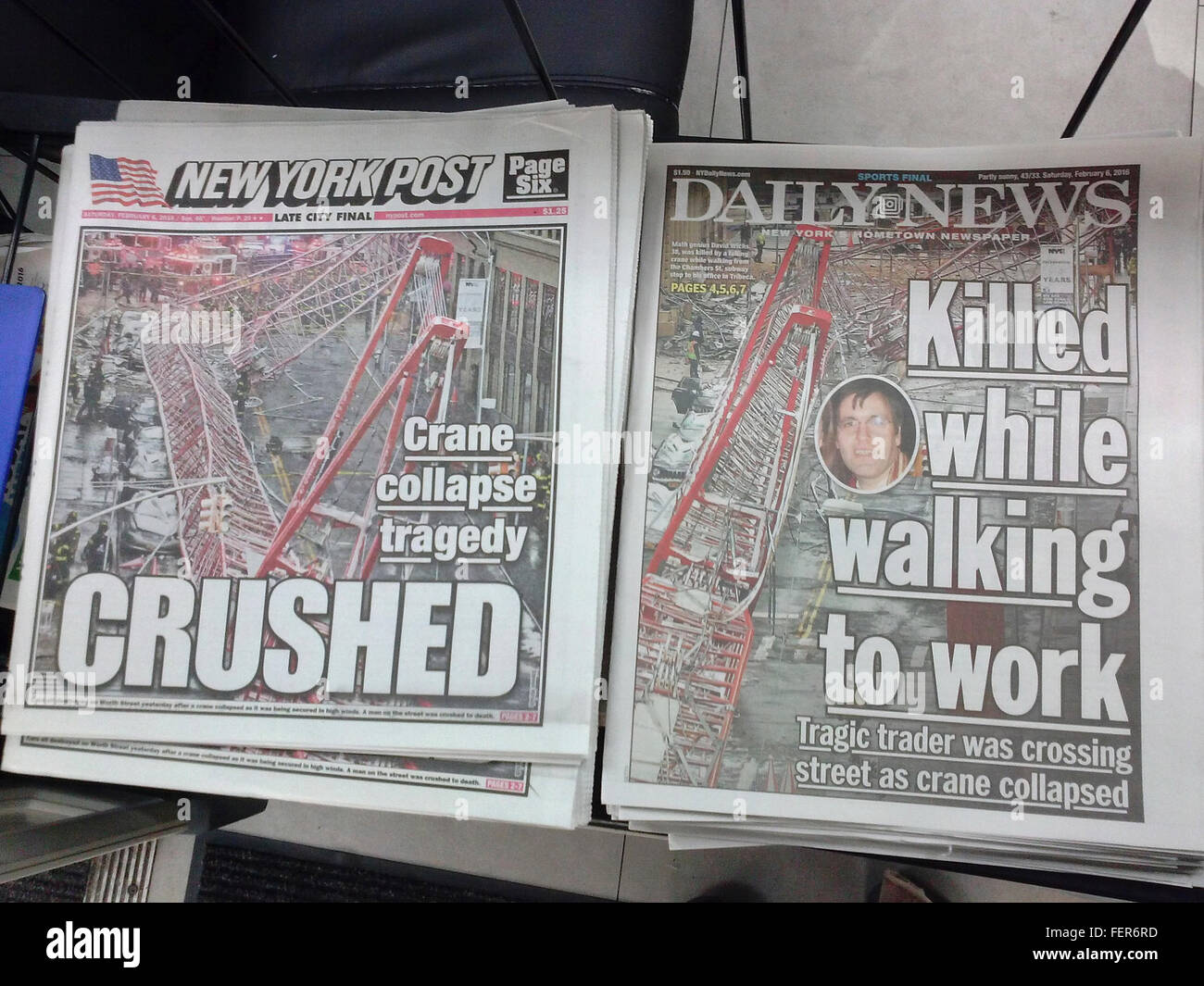 New York Daily News and Post tabloid newspapers on a newsstand on Saturday, February 6, 2016 report on the previous day's crane collapse in Lower Manhattan killing David Wichs. (© Richard B. Levine) Stock Photo