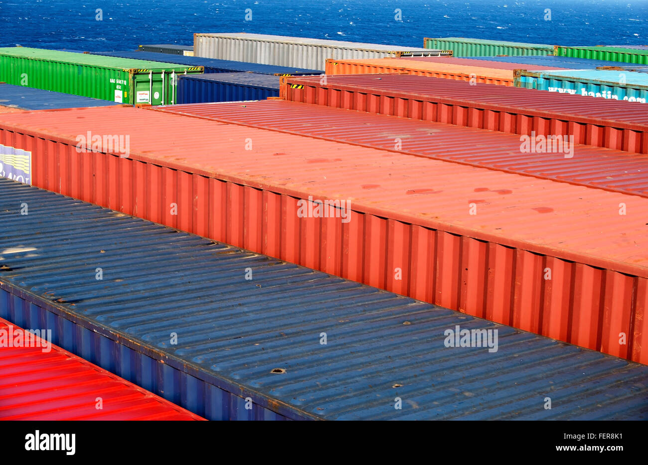 Shipping containers stacked at the prow of CC Corte Real container ship as it sails from Port Kelang to Southampton. Stock Photo