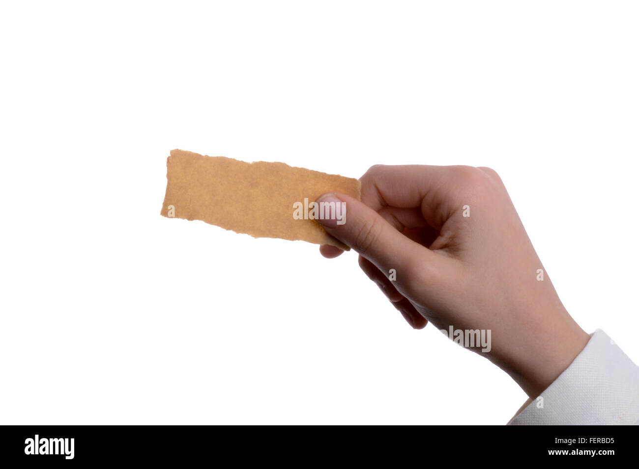 hand holding a piece of torn paper Stock Photo Alamy